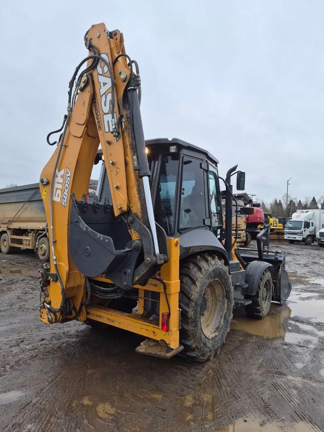 Экскаватор-погрузчик CASE 580SV